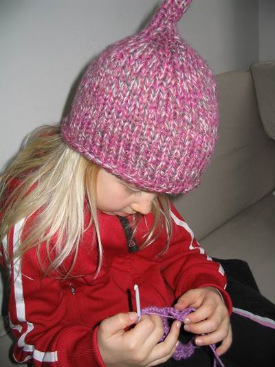 Ebba is crocheting