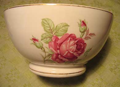 A big bowl with roses on