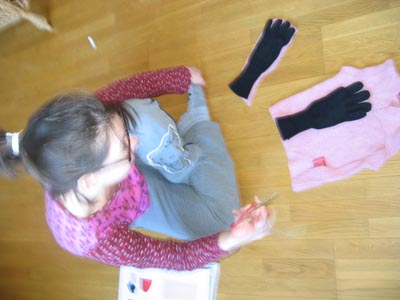Hanna making wool mittens from recycled wool