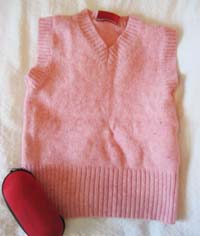 Wool slipover that shrunk in the washing machine and will now be recycled