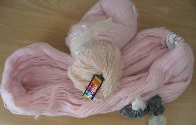 Goodie bag of thrifted yarn included two skeins of soft bright pink yarn (Copyright Hanna Andersson)