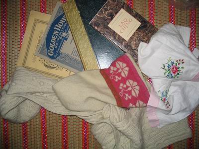 Tao te ching, music notes for collage and embroidered rose towels thrifted pile (Copyright Hanna Andersson)