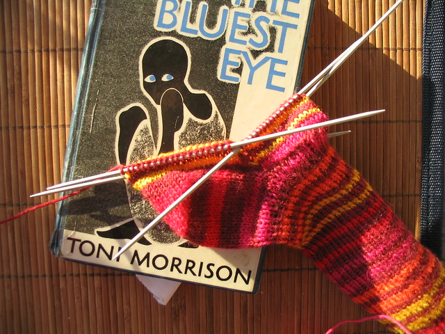 Knitting striped socks and reading the Bluest Eye by Toni Morrison