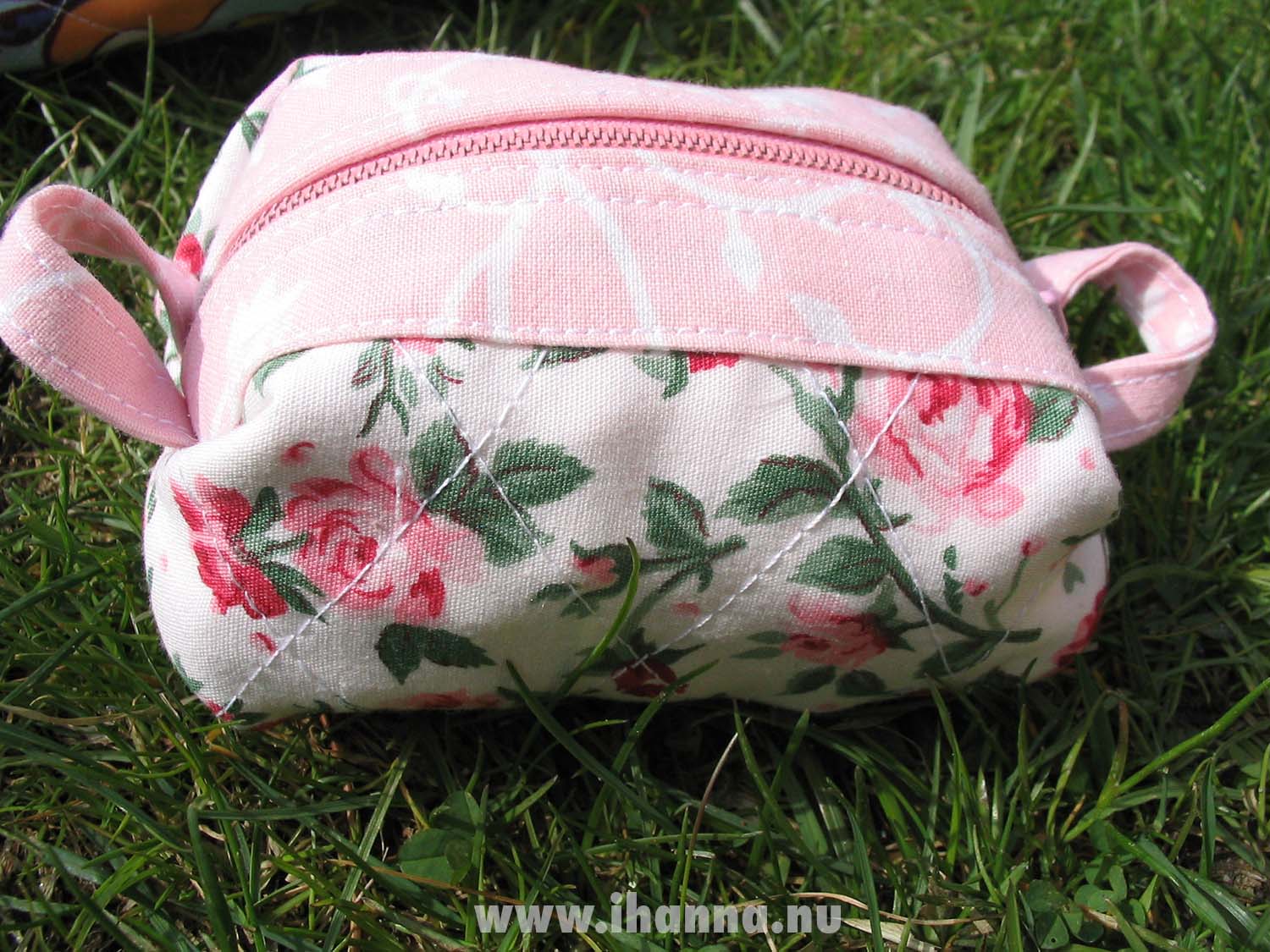 A small pouch in pink rose fabrics, made by my mom (Photo Copyright Hanna Andersson)