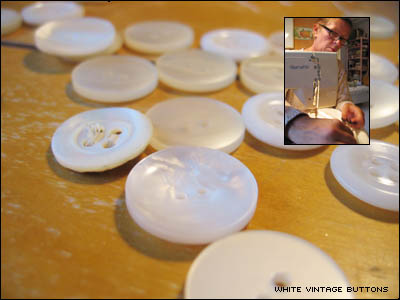 Using white vintage buttons and mom helping me sew the button holes 