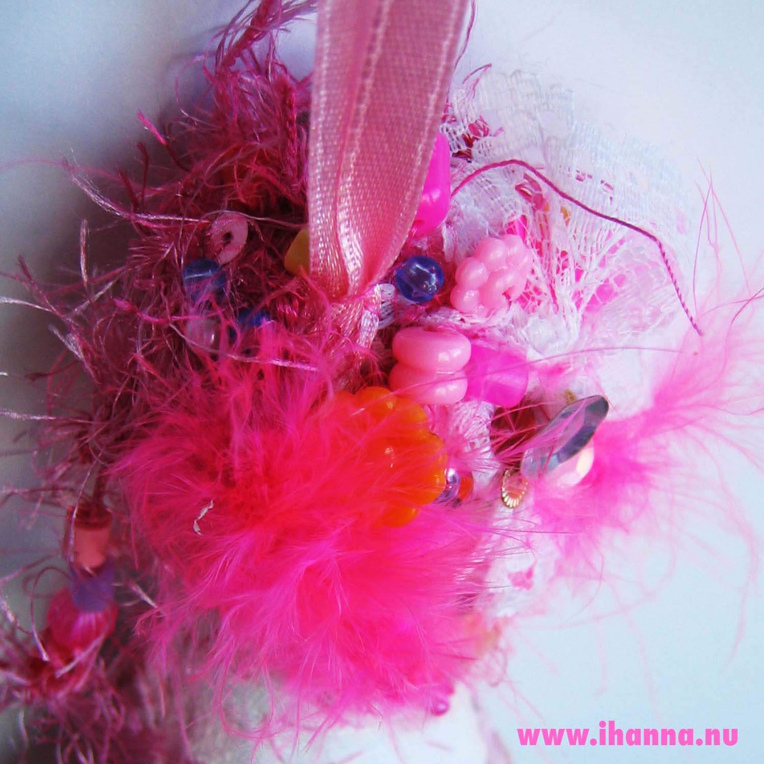 Iris my first art doll in textile material back head decorated with feathers and beads