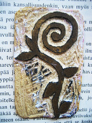 Hand carved swirl stamp by iHanna used on these pages