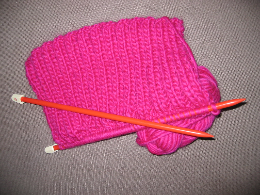 Knitting with pink yarn (Photo copyright Hanna Andersson)