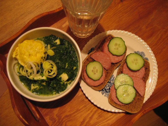 Dinner for once by me Spinach soup with an egg in and sandwiches on the side
