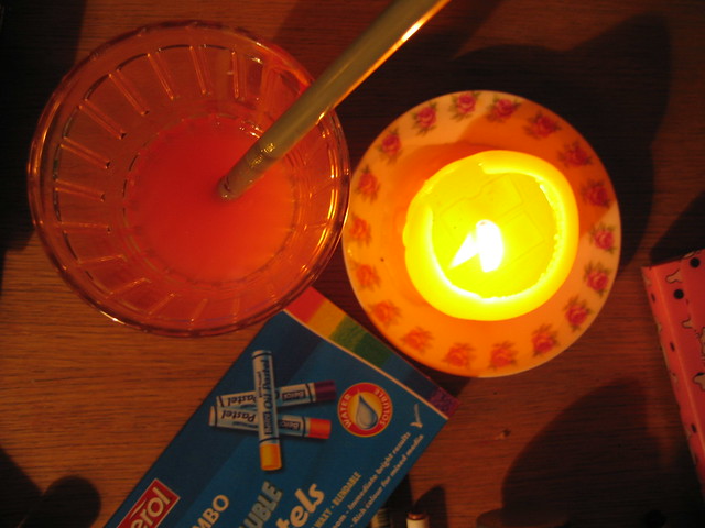 Candle, crayons and lemonade looking paint water 2005