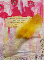 Detail of a tissue paper pocket with a feather inside - Take your wings and fly in Book of dreams (Copyright Hanna Andersson)