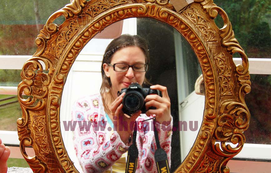 Taking self portraits in the mirror on the floor 