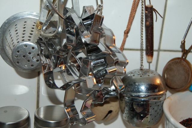 Kitchen gingerbread cookie cutters hung up with tea bells 2006