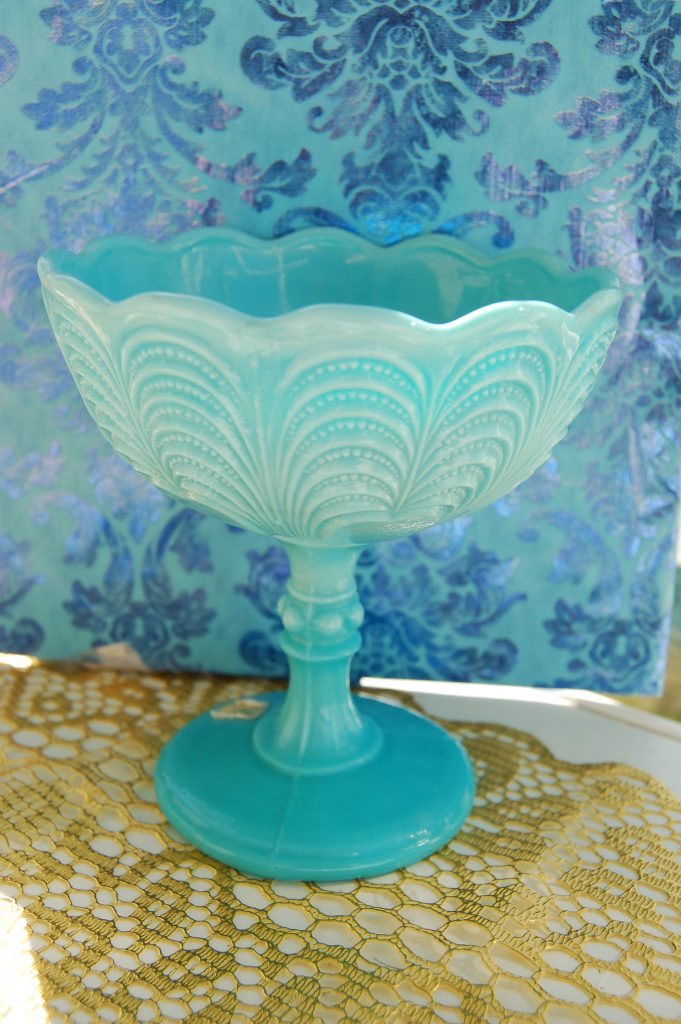 Turquoise opaque pressed glass bowl photo by Hanna Andersson