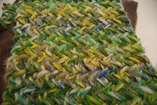 Close up of my friend Ingers knitted scarf made in the pattern My so called scarf in green