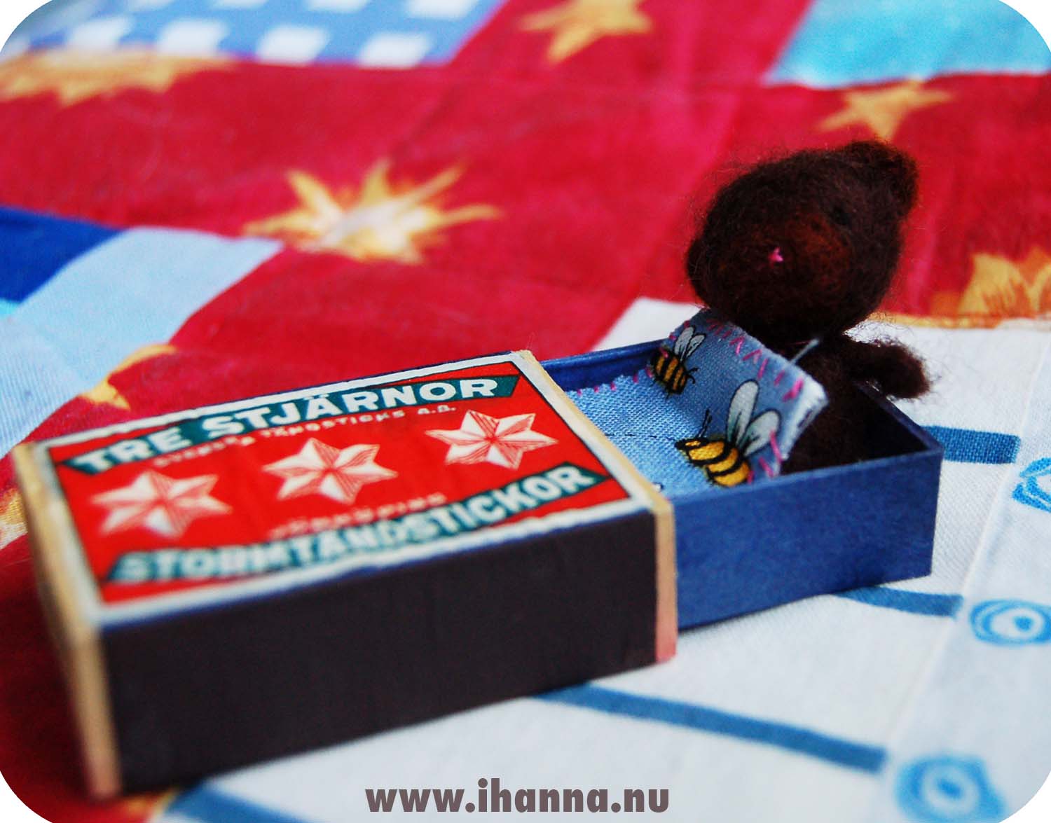 Tiny Teddy is needle felted by hand and sleeps in a tiny matchbook box bed (Copyright Hanna Andersson)