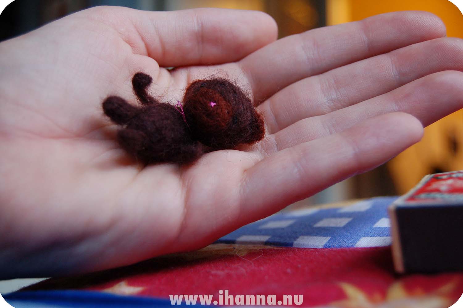 Tiny felted teddy fits inside the palm of my hand (Photo Copyright Hanna Andersson)