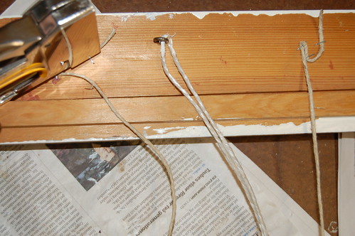 Stapling the string to my inspiration board frame by iHanna (Copyright Hanna Andersson)