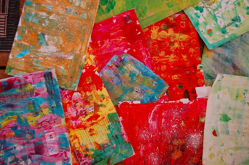 Painted background papers smear, paint and spill acrylic paint onto paper (Copyright H. Andersson)
