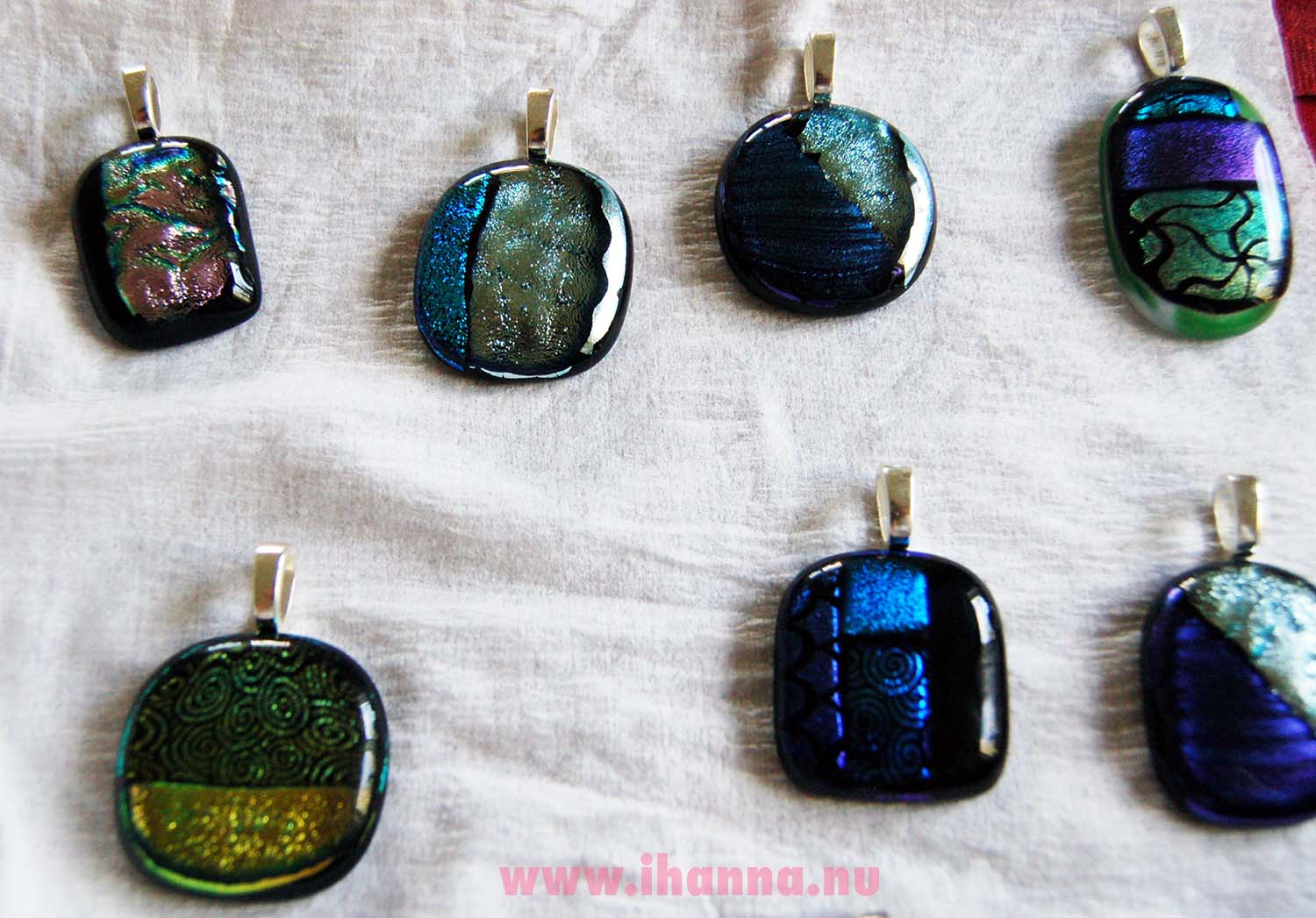 Finished necklace pieces in fused glass with Glue-on Flat hangers made by iHanna (Photo Copyright Hanna Andersson)
