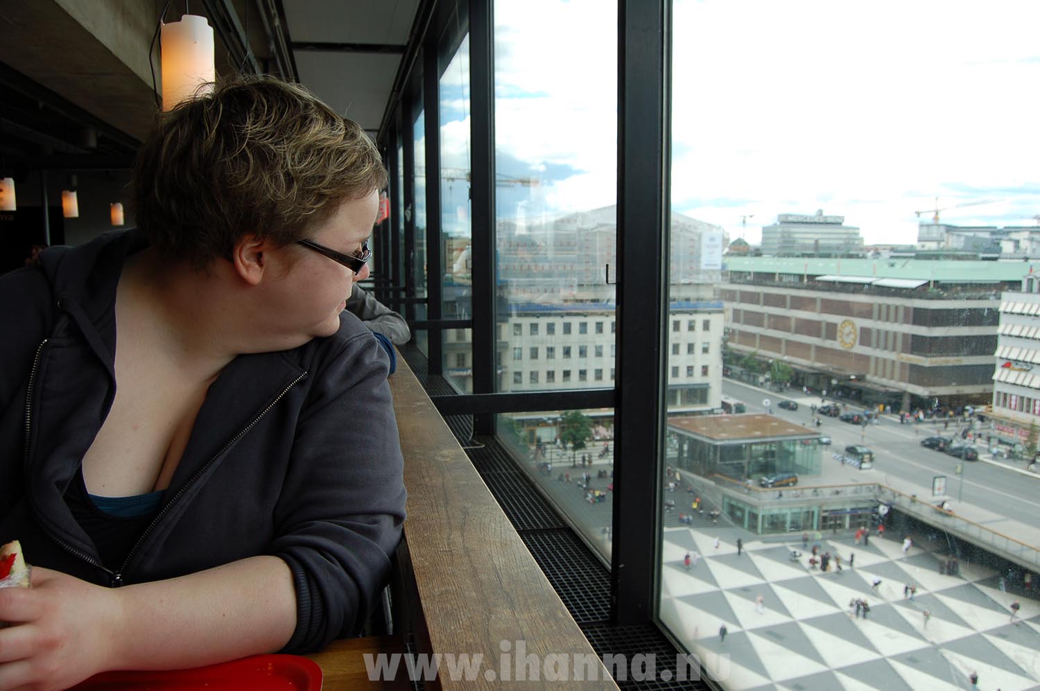 My friend looking down to Sergels torg in Stockholm (Photo copyright Hanna Andersson)