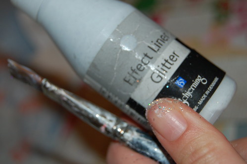 Make a Christmas Tag using lots of glitter of course (Copyright Hanna Andersson)