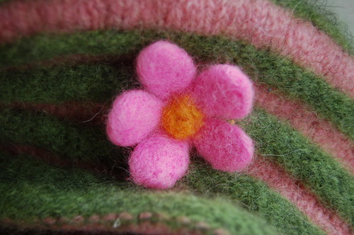 My new knitted pink and green cap with hand felted wool flower (Copyright Hanna Andersson)