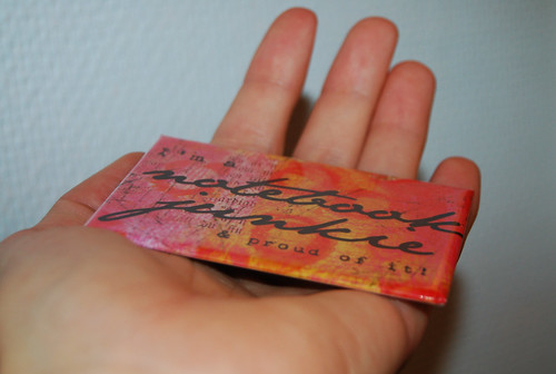 Notebook junkie magnet design in my open hand (Design and photo copyright Hanna Andersson)