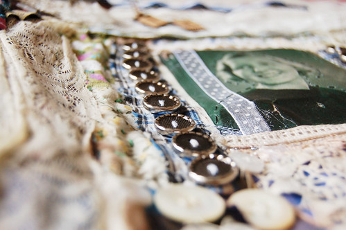 Art Quilt - detail of my grandma tribute quilt at a side angle with the buttons from her dress (Copyright Hanna Andersson)