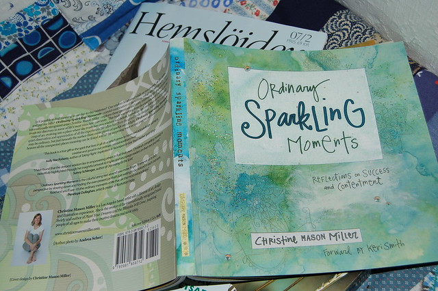 Reading Ordinary Sparkling Moments book open (Photo copyright Hanna Andersson)