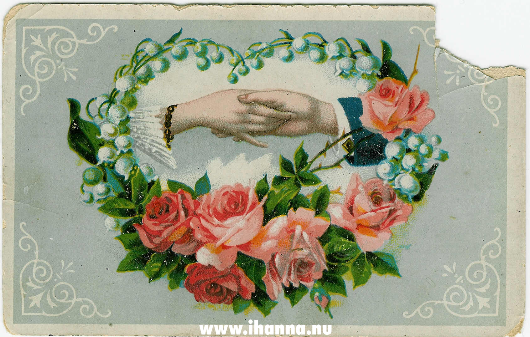 Vintage Postcard with a couple holding hand in a ring of flowers scanned by me