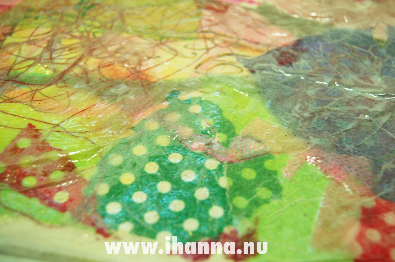 Polka dot tissue paper layered with other thin papers (Photo copyright Hanna Andersson)