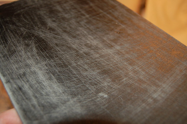 Sanded down black notebook cover with iHanna (photo copyright Hanna Andersson)