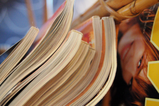 Sorting through magazines to cut up for collage and art journaling in some fun magazine cutting therapy - blog post by iHanna -  (Photo Copyright : Hanna Andersson) 2010