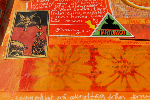 Orange detail of stickers and spray painted color in art journal by iHanna #monochromatic (Copyright H. Andersson)