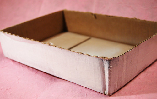 White delivery box in a DIY tutorial of how to create a striped scrap inbox for collage (Photo Copyright Hanna Andersson)