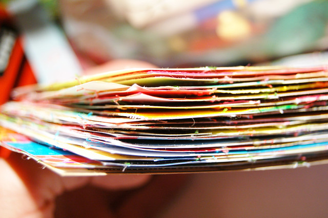 Painted postcard pile in my hand cards that will become DIY Postcards for the DIY Postcard Swap (Photo copyright Hanna Andersson)  