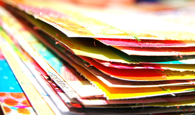 Painted postcard edges in a big pile that will become DIY Postcards for the DIY Postcard Swap (Photo copyright Hanna Andersson) 