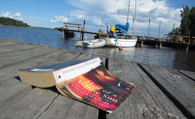The book Half of a YellowSun on the water while we fish kind of (Photo Copyright Hanna Andersson)