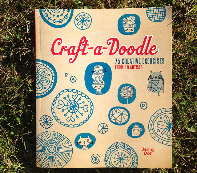 Craft-a-Doodle book by Jenny Doh on the grass (Photo copyright H. Andersson)