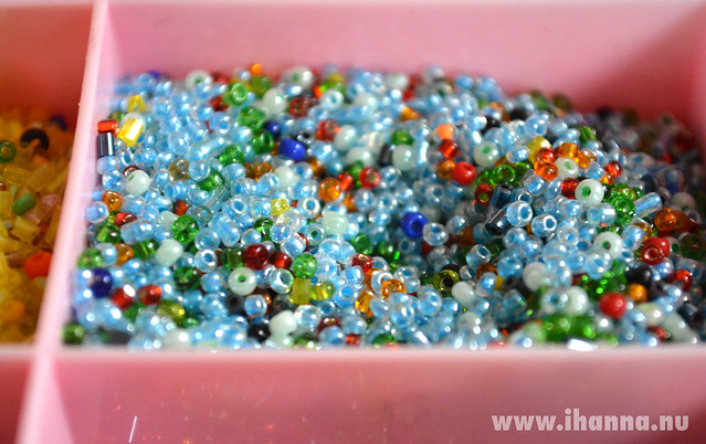Turquoise seed beads as eye candy and art material in pink box (Photo copyright Hanna Andersson)