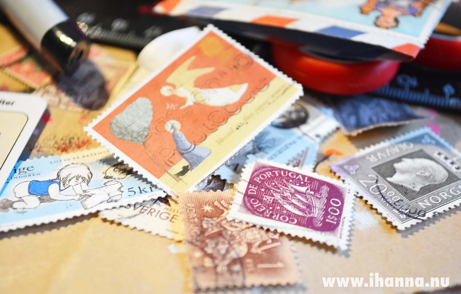 Tiny Art collection of postal stamps in a pile (Photo copyright H. Andersson)