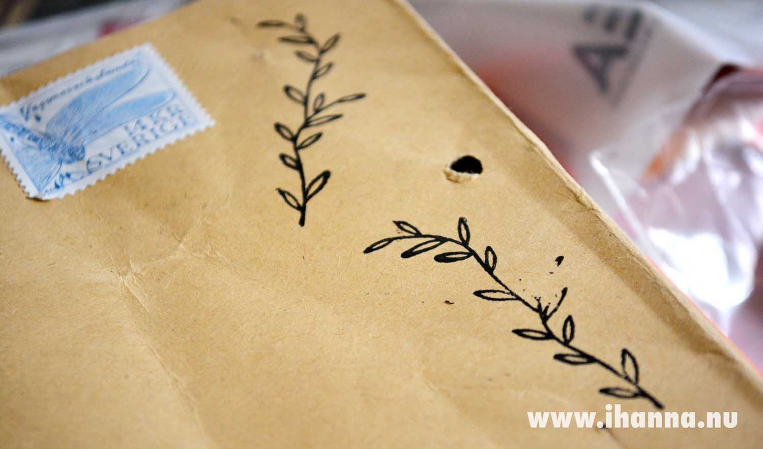 Stamped twigs on a brown paper envelope (Copyright Hanna Andersson)