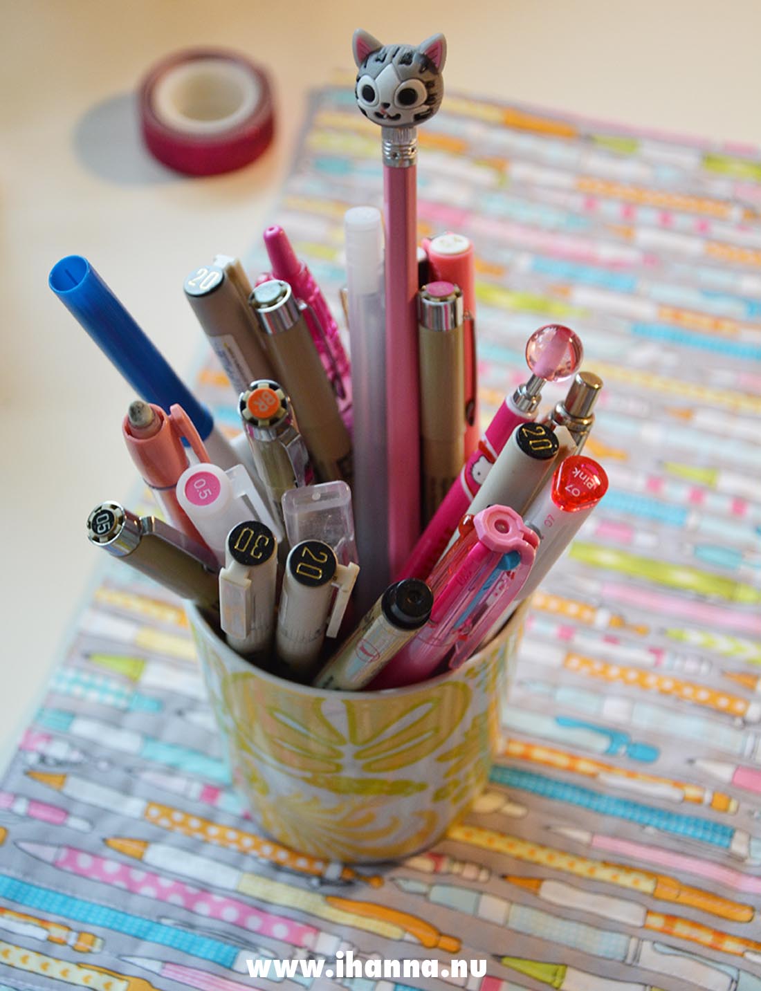 Pen cup on pencil patterned table cloth that I sewed for my desk - photo copyright Hanna Andersson