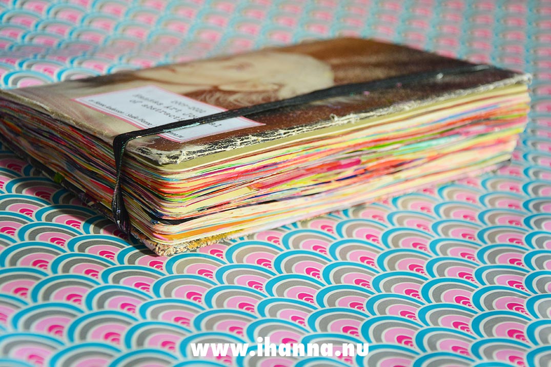 Side view of my filled Art Journal with colorful edged pages. Photo copyright Hanna Andersson Studio iHanna
