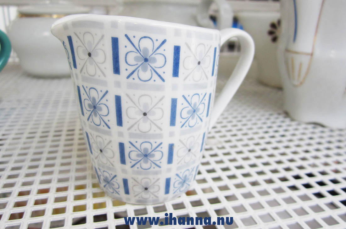 A small pitcher with a cute blue flower pattern - thrift shop inspiration found by Hanna Andersson
