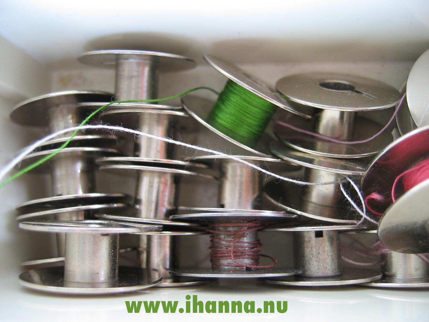 Empty and full sewing machine bobbins (Photo copyright Hanna Andersson)