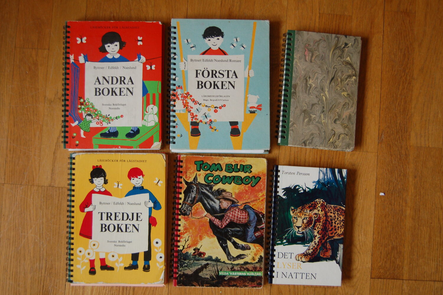 A few of the many ring-bound notebooks that I have created from vintage Swedish school and children's books.