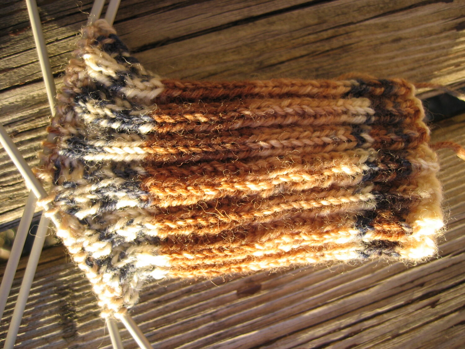 Knitting a brown sock (Photo copyright Hanna Andersson)