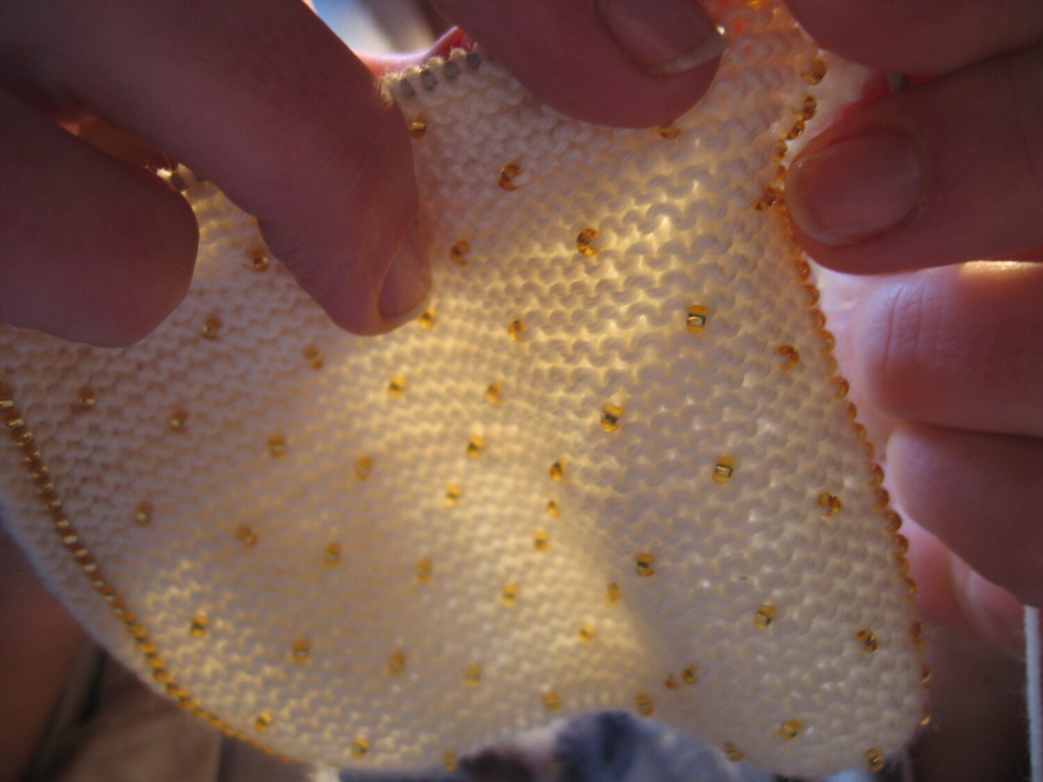 Mom knitting using wool and little beads 2005 (Photo copyright Hanna Andersson)